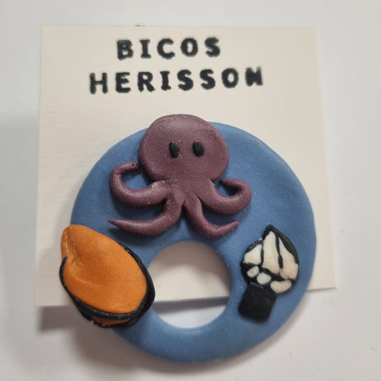 Broche cuelga gafas marino