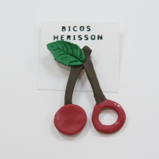 Broche cuelga gafas cereza