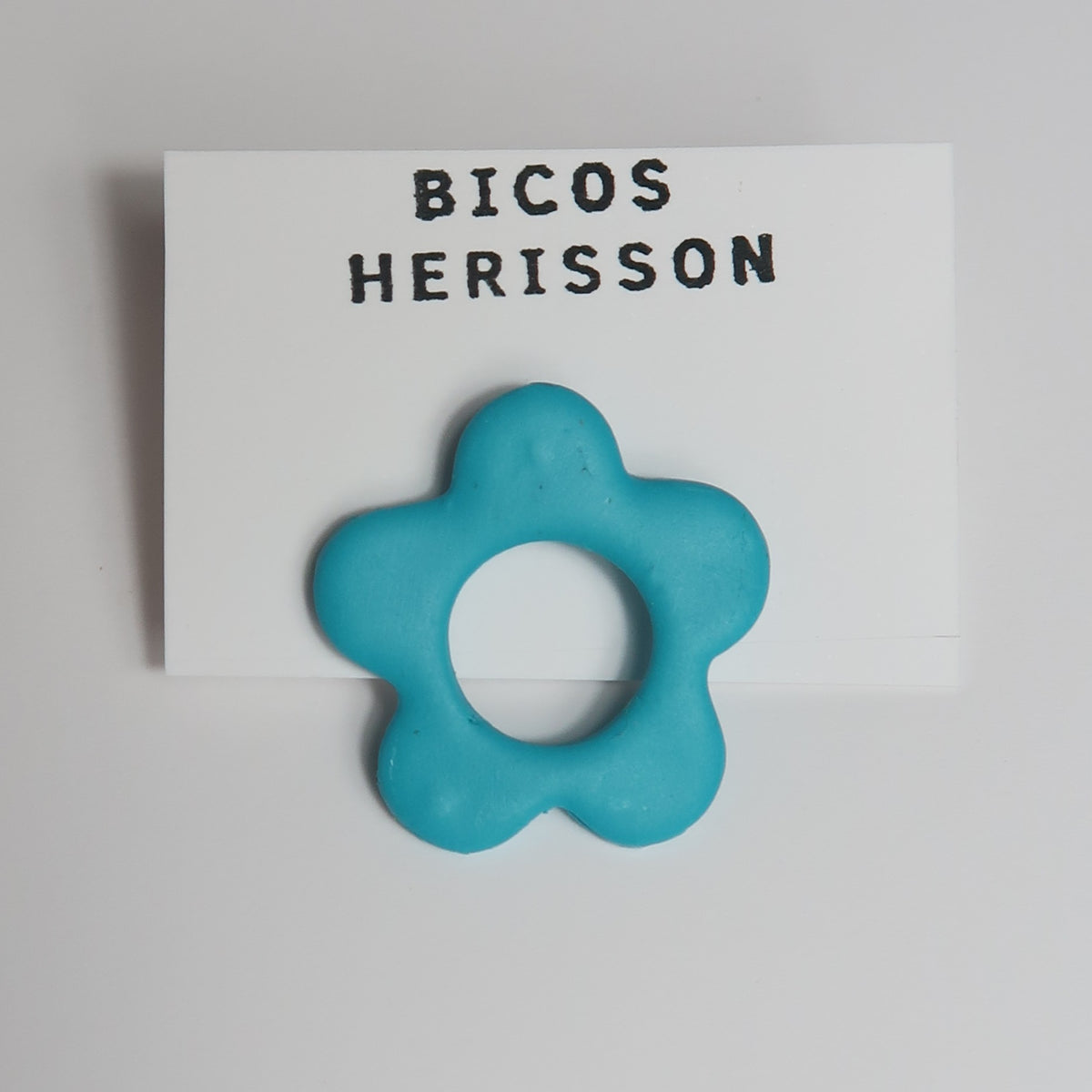 Broche cuelga gafas flor