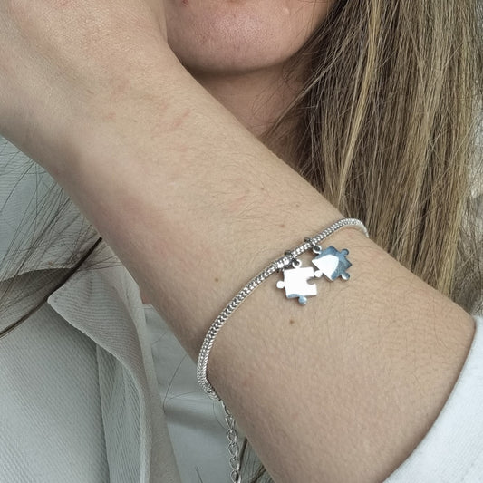 2 piezas de puzzle acero