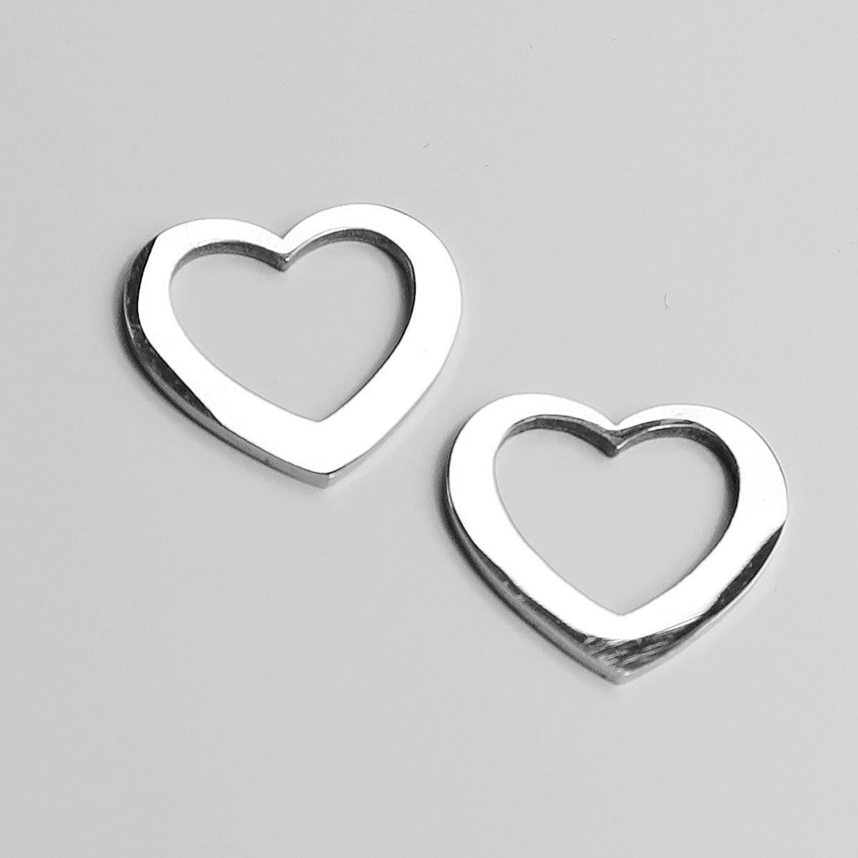 2 piezas corazón acero