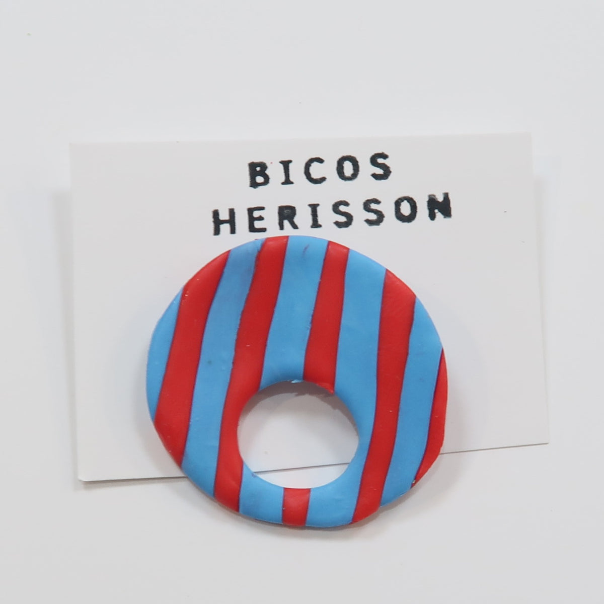 Broche cuelga gafas rojo y azul