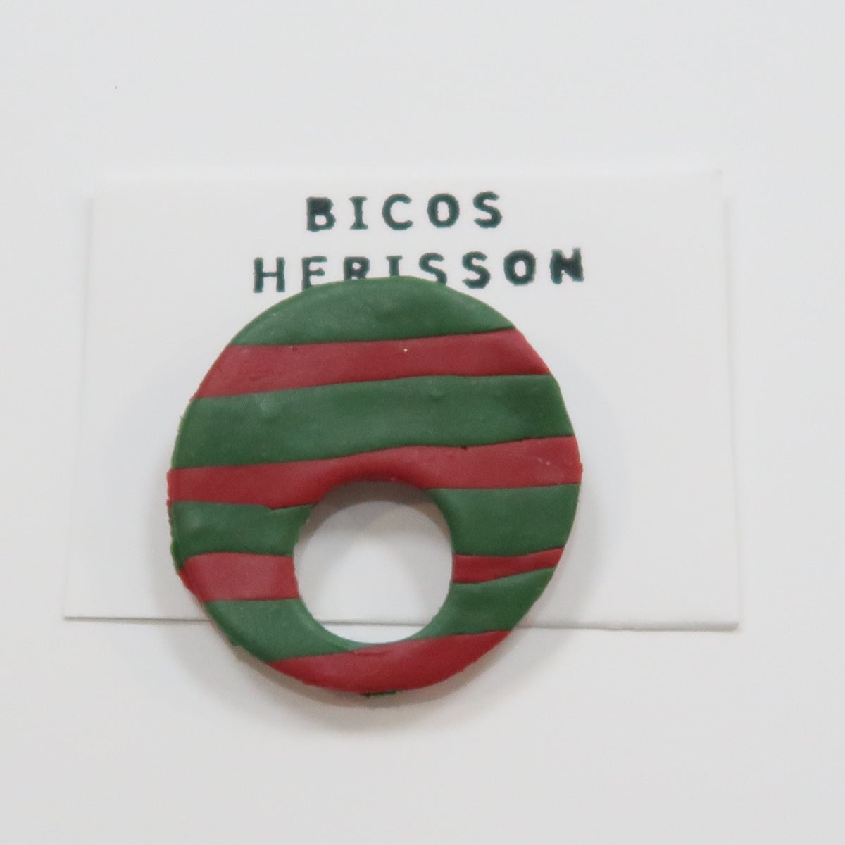 Broche cuelga gafas rojo y verde