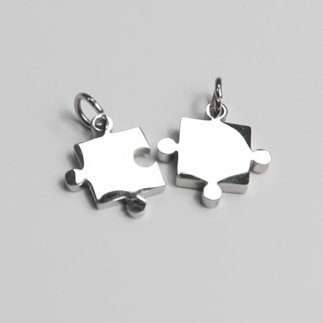 2 piezas de puzzle acero