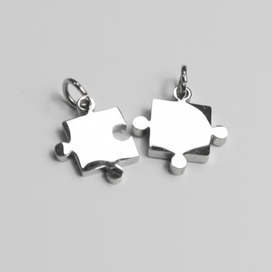 2 piezas de puzzle acero