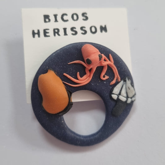 Broche cuelga gafas marino